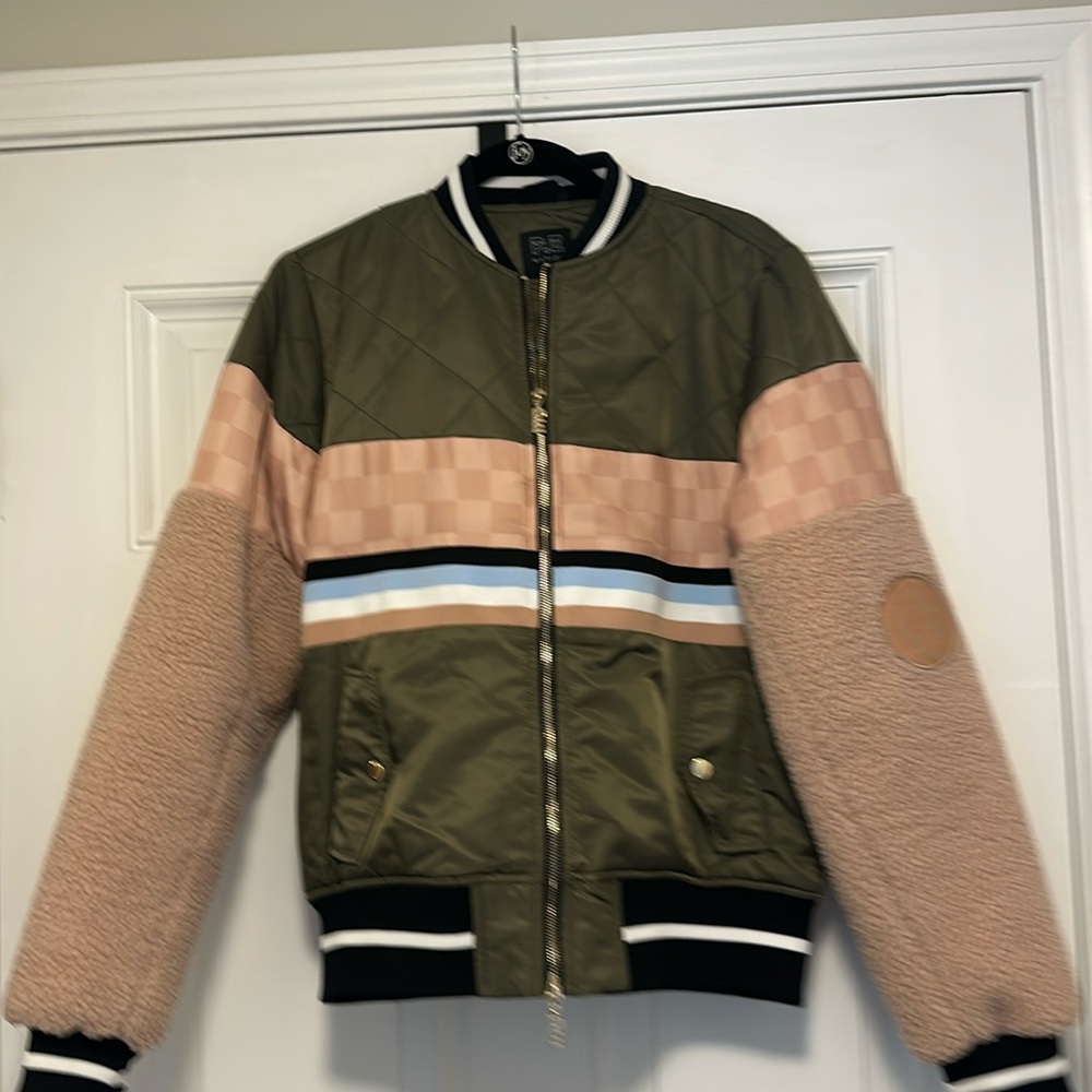 P.E nation varsity jacket worn once